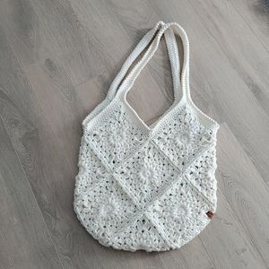 Cream knit hobo style bag